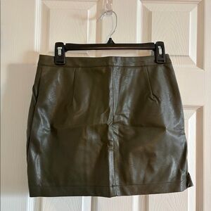 Green leather mini skirt